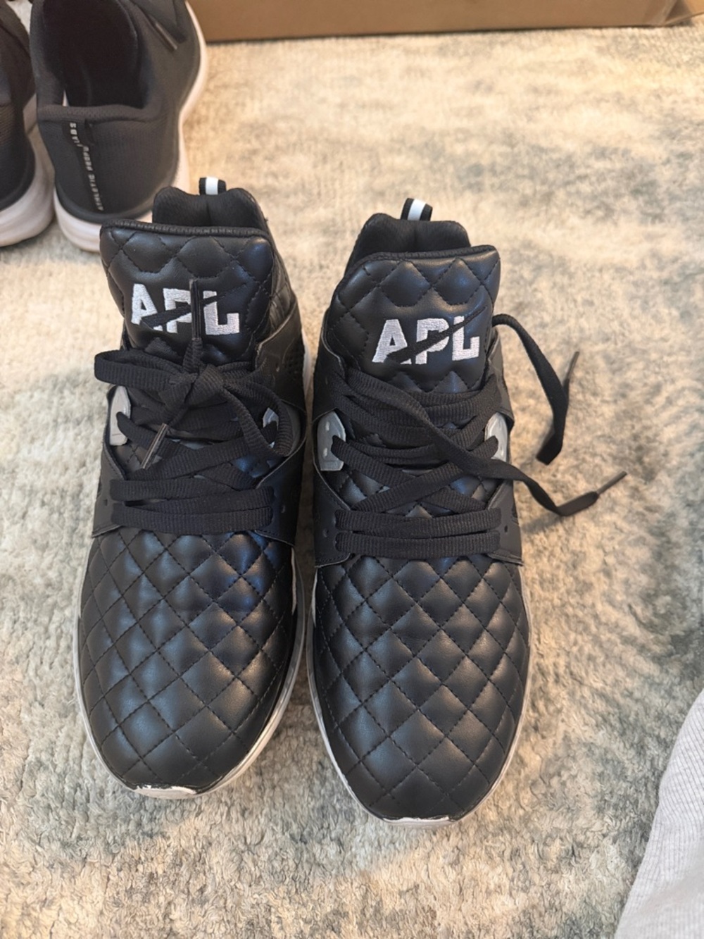 APL Quilted High-Top Sneakers in Black with White Logo